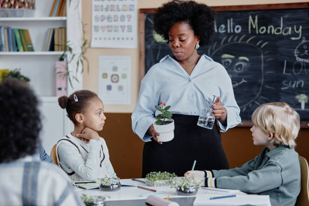 istock Young Focused Students Learning about Photosynthesis in Classroom 2162419625
