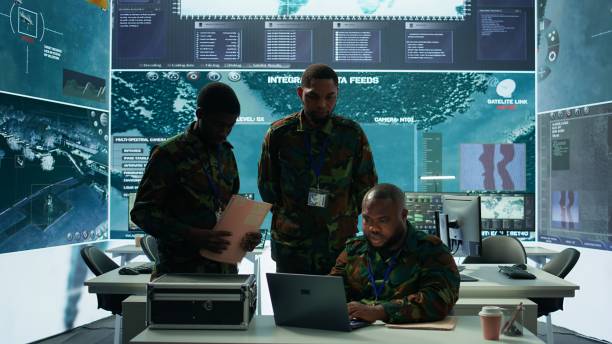 istock Military personnel in a modern command center handle critical information 2162423345