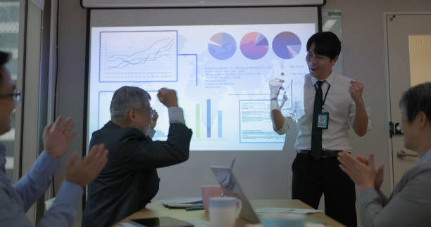 istock businessman do presentation in boardroom 2162423884