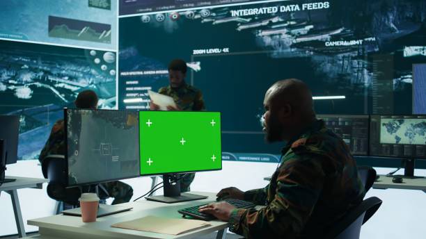 istock Soldier analyzing real time data next to green screen in high tech office 2162424195