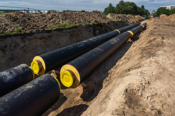 istock Newly laid pipe in a fresh trench. Unfinished pipeline 2162424908