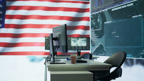 istock Empty military control center with a big screen shows the American flag 2162425001