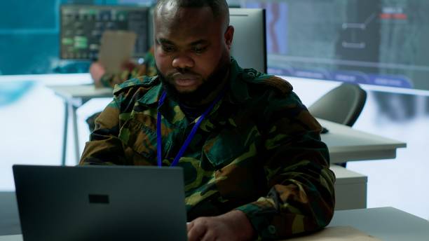 istock IT analyst in a high tech base of operations handling surveillance activity 2162425091