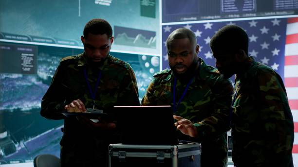 istock Military officer in a high tech control center engages in cybersecurity operations 2162425129