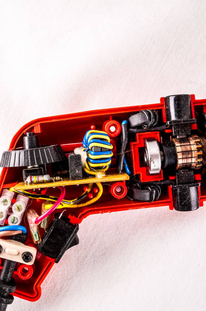 istock A red toy with wires and a black and yellow coil inside 2162425559