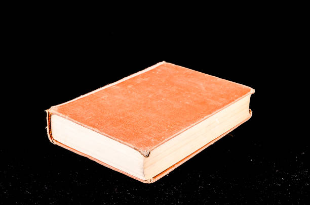 close up of the texture of a Muslim holy book called the Koran on a prayer mat, Koran on the mat with low light