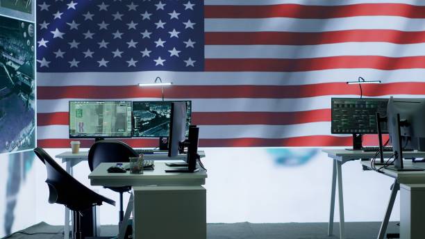 istock Empty military control center with a big screen shows the American flag 2162426693