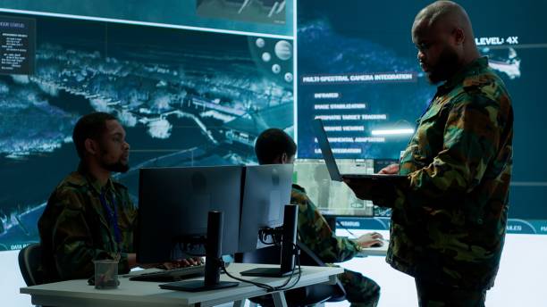 istock Cybersecurity team operates in an advanced military command center 2162426834