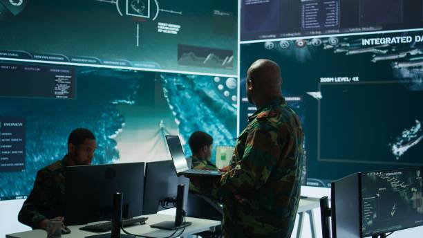 istock Cybersecurity team operates in an advanced military command center 2162426987