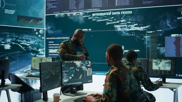 istock Military officer leads cybersecurity efforts in a high tech control center 2162427244