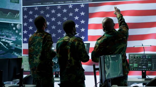 istock Military personnel work in a high tech environment safeguarding classified data 2162427259