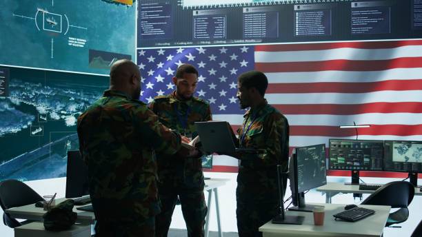 istock Government intelligence officers in control room manage surveillance operations 2162427516