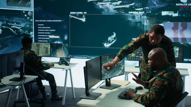 istock Military staff in a modern operations hub handling critical information 2162427764