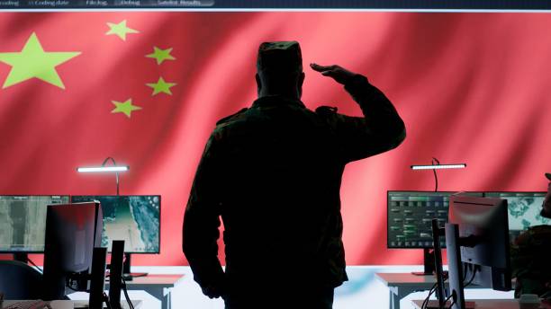 istock Chinese military officer in uniform monitors critical data on big screen 2162427903