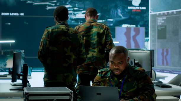 istock Soldiers team analyze real time data collected by surveillance system 2162428029