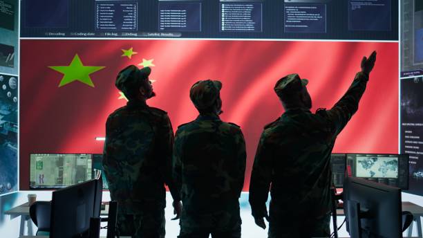 istock Cybersecurity specialist in Chinese military command post analyzes data to inflict fear 2162428061