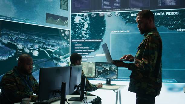 istock Military officers work in a high tech army control tower base 2162428137