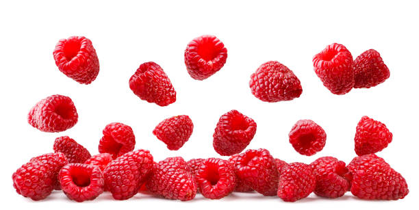 istock Raspberries falling on a pile close-up on a white background. Isolated 2162429237
