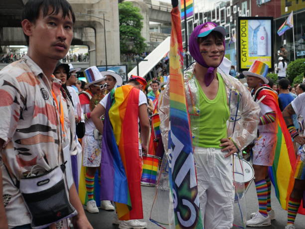 During the 50th Anniversary of Stonewall in New York, millions joined together to celebrate where it all began. As the parade began and the temperature became unbearable, the energy and love just kept getting hotter. Everyone felt love for one another as these two embraced during the celebration.