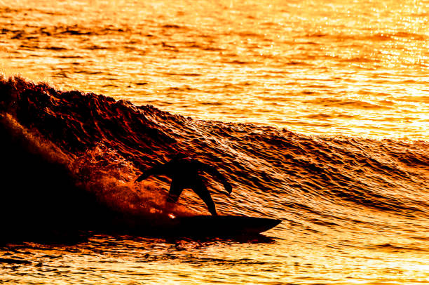 istock A surfer is riding a wave in the ocean 2162431134
