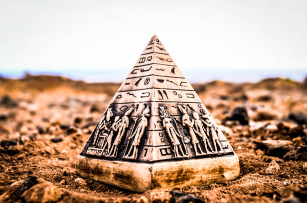 Pyramids of Giza, Egypt - July 26, 2022: All three of Giza's pyramids and their elaborate burial complexes were built  from roughly 2550 to 2490 B.C. The pyramids were built by Pharaohs Khufu, Khafre, and Menkaure. In 1979 the Pyramids of Giza became a UNESCO World Heritage Site. Furthermore, the pyramids are also included on the list of the Seven Wonders of the Ancient World.
