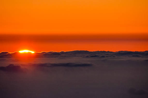 istock The sky is orange and the sun is setting 2162432392