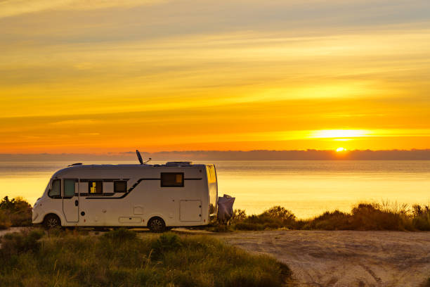 istock Caravan on sea at sunrise. 2162433849