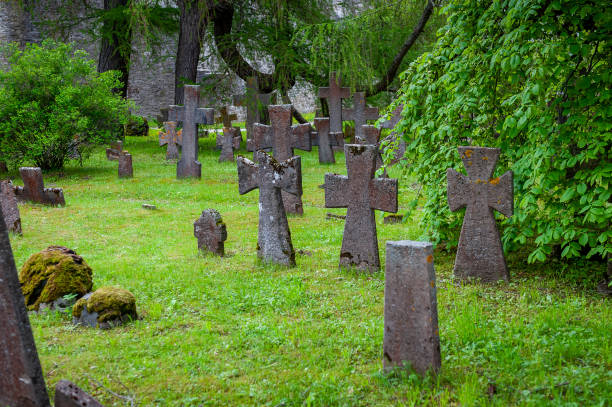 istock Old stone crosses on old monastery cemetery. 2162435031