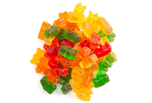 istock Rainbow Colored Bear Shaped Gummy Candies Isolated on a White Background 2162439101