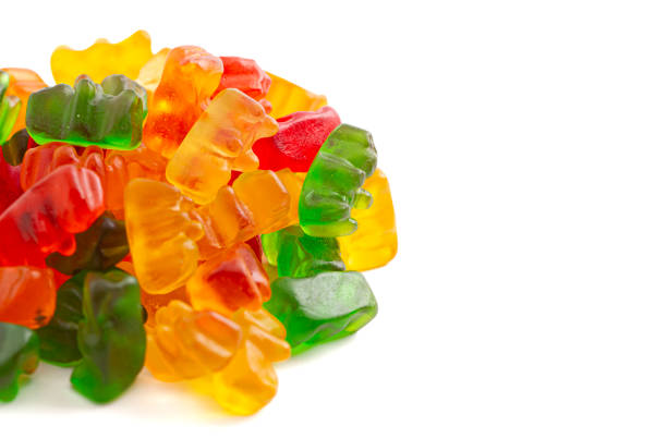 istock Rainbow Colored Bear Shaped Gummy Candies Isolated on a White Background 2162439105