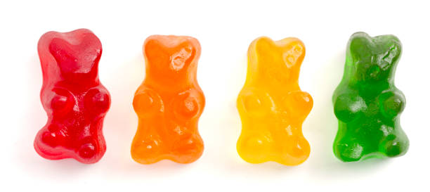 istock Rainbow Colored Bear Shaped Gummy Candies Isolated on a White Background 2162439106