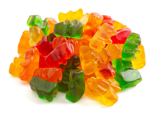 istock Rainbow Colored Bear Shaped Gummy Candies Isolated on a White Background 2162439107