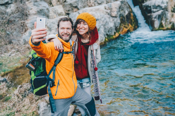 istock Couple on journey taking selfies 2162441610