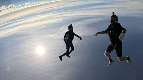 istock Freefall jumpers face each other mid-air 2162443688