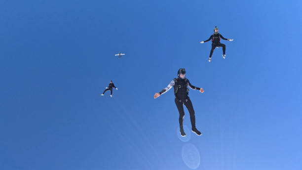 istock Freefall jumpers perform moves mid-air 2162443702