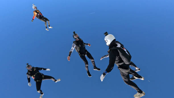istock Freefall jumpers perform moves mid-air 2162443709