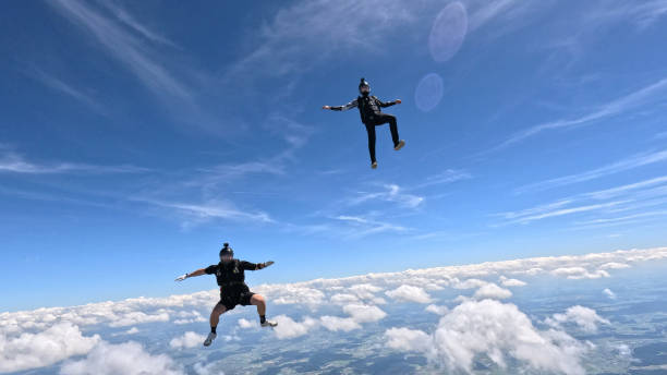 istock Freefall jumpers face each other mid-air 2162443715