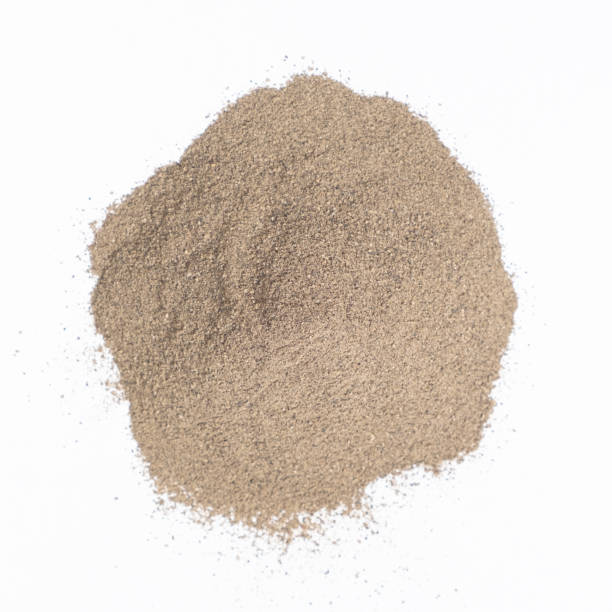 istock Spilled ground black pepper spicy seasoning on a white background 2162447150