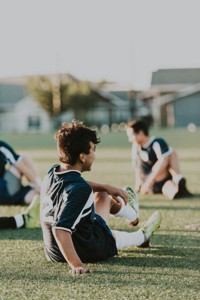 istock Adult soccer team stretches before a game 2162449534