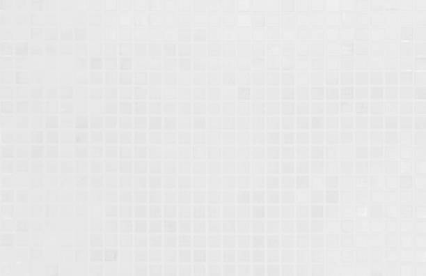 istock White tile wall chequered background bathroom texture. Ceramic brick wall and floor tiles mosaic background in bathroom and kitchen clean. Design pattern geometric with grid wallpaper decoration. 2162460876