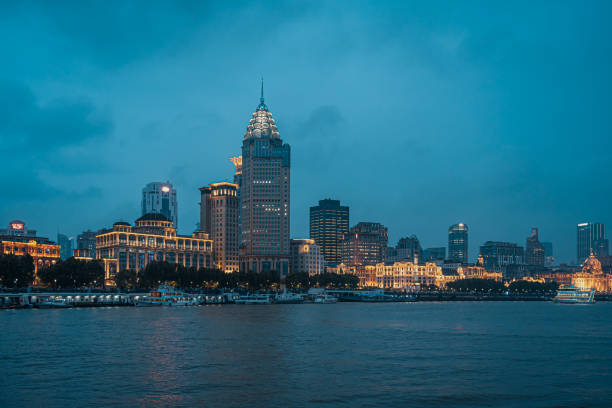 Urban skyscrapers in Shanghai at night;