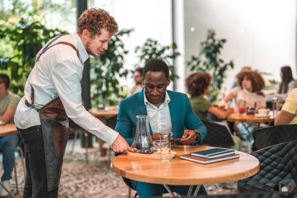 istock Black Businessman Finding Tranquility in Modern Cafeteria 2162461743