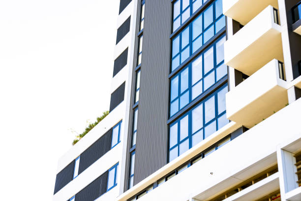 Closeup low angle view of modern apartment buildings, background with copy space, Sydney, full frame horizontal composition