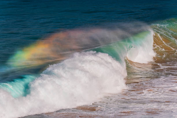 istock Rainbow light in the Waves at Whale Beach 2162463880