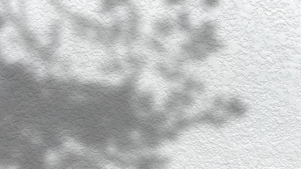 istock The pattern of surface white wall concrete and shadow background. Abstract of surface white wall concrete and shadow of  background. Rusty damaged to surface wall. Wall 2162480357