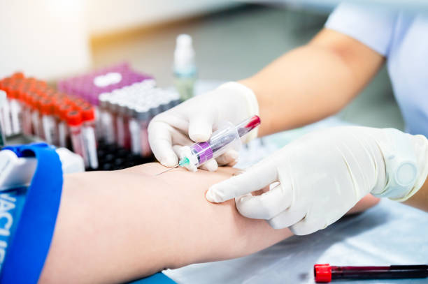 istock taking blood sample from a patient in the hospital. 2162481331