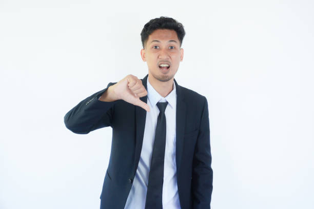 istock Asian manager wearing black suit give bad evaluation sign during interview process 2162481608