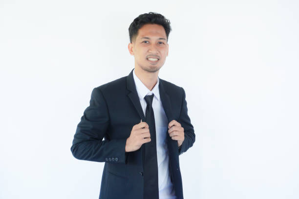 Asian businessman smiling confident at the camera