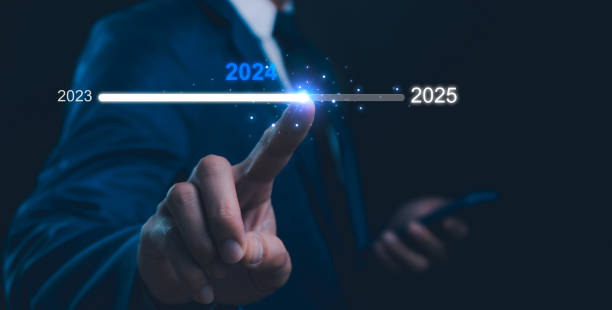 istock Businessman touch on loading progress from 2023 to 2025,Planning and challenge strategy in new year 2024 Concept. New business startup to 2025. New year 2025 is loading, calendar date, end of the year 2162481684