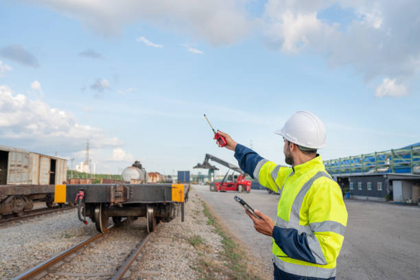 istock Engineer railway wearing safety uniform and helmet under checking train. 2162482496